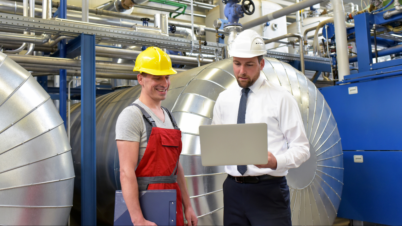 Maintenance worker with leadership working together